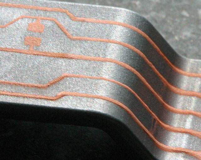 Copper conductor path structure on an MID component.