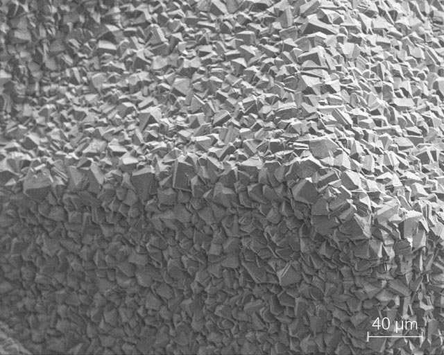 SEM micrograph of an apex of a pyramid, layer thickness 24 µm.