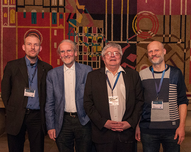 Holger Gerdes (Chairman of the conference), Mayor Dr. Helmut Blöcker, Prof. Dr. Günter Bräuer (Chairman of the conference), and the initiator of the conference, Prof. Dr. Diederik Depla (from left to right) during the evening event in the Dornse of the historic Old Town Hall.
