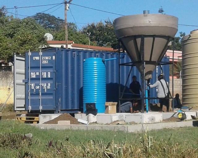 View into the SafeWaterAfrica containerized water purification unit in Ressano Garcia, Mozambique.