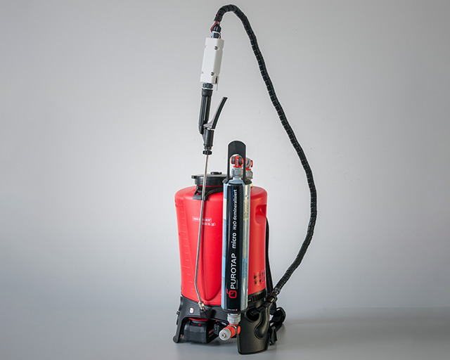 Mobile backpack sprayer for the efficient production of ozonated water for surface disinfection.